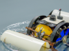 Scientists have created a malleable robot that can transition smoothly from land to water.