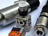 Small, compressed hydraulic/pneumatic detectors are used to measure displacement.